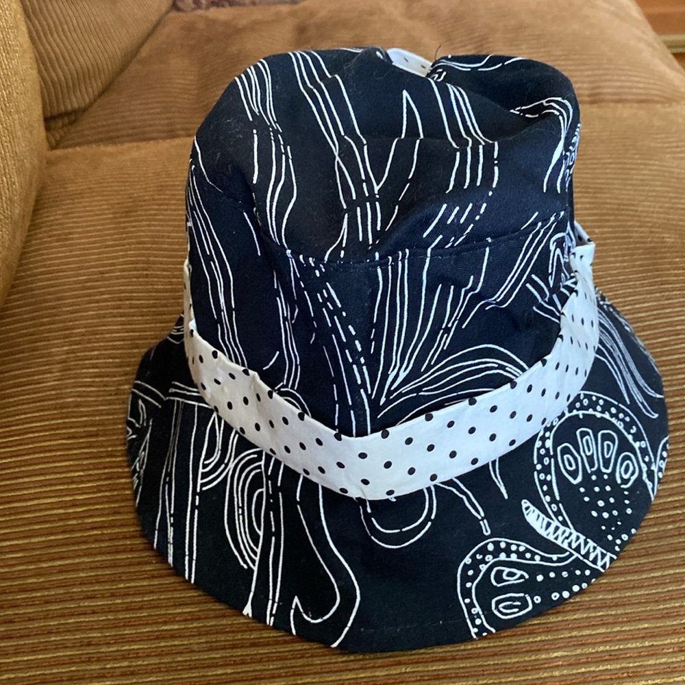 Black & White Hat With BOW In Back. SO CUTE ON!!!      NEW. Never Worn. $15.